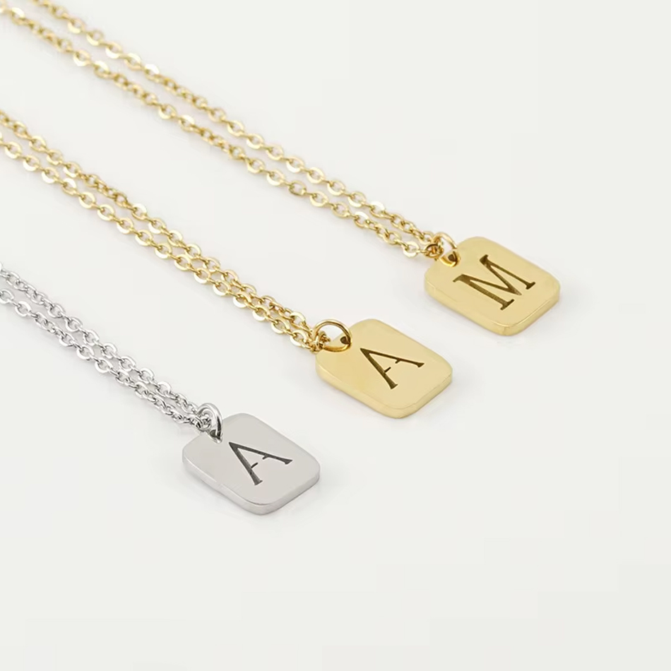 OEM joyería personalizada hueco delicado lindo inicial letra alfabeto colgante de acero inoxidable joyería de moda collar al por mayor
