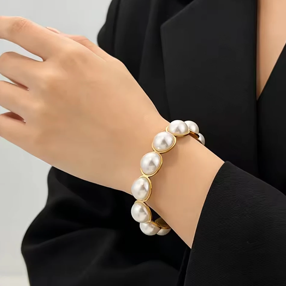 Pulsera de acero inoxidable de moda, acero de titanio y perla, pulsera de alta gama elegante y que n
